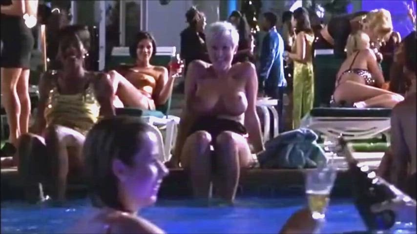 Deborah Kellner and an uncredited topless woman showcase a steamy sideboob moment in the PG-13 movie A Night at the Roxbury (1998)
