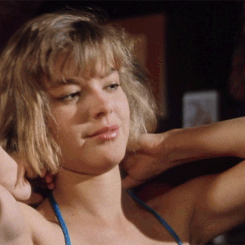 Janelle Brady in a nude scene from Class of Nuke ‘Em High (1986)