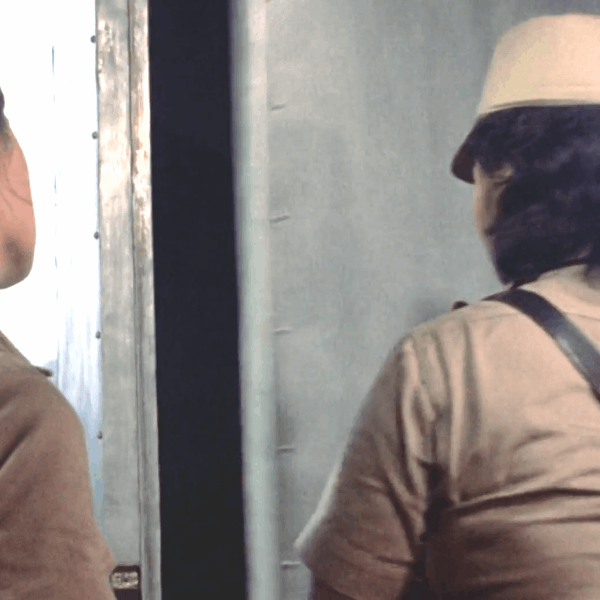 Pam Grier and Margaret Markov showcase an intense nude scene in Black Mama White Mama from 1973.
