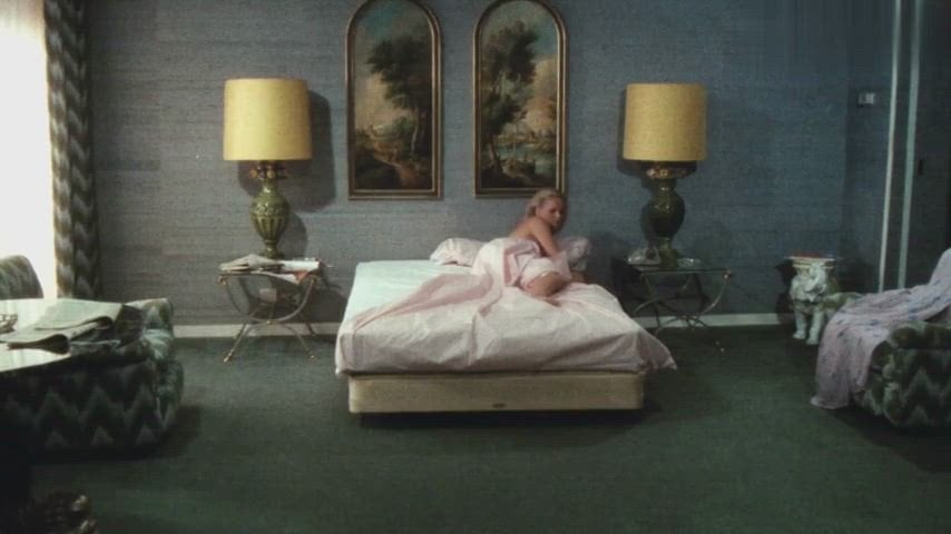 Ursula Andress in a nude sex scene from Loaded Guns (1975)