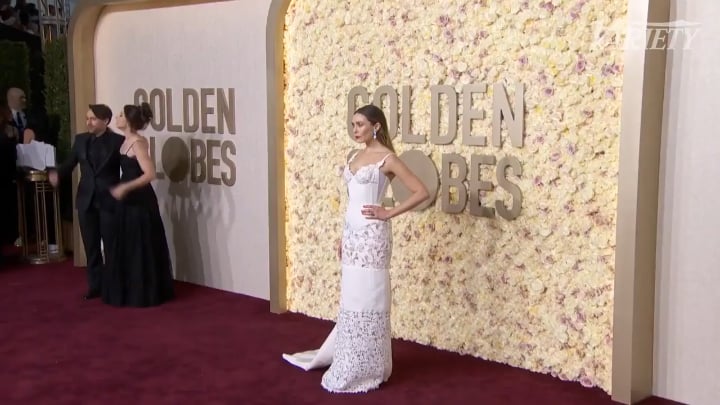 Hot and Sexy Elizabeth Olsen Shows Off Her Curves